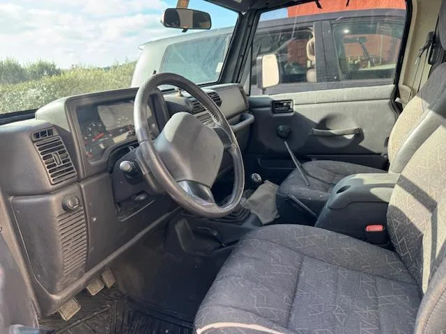 Jeep Wrangler TJ 2,5L Sport — 4 — Chibron Automobiles Services